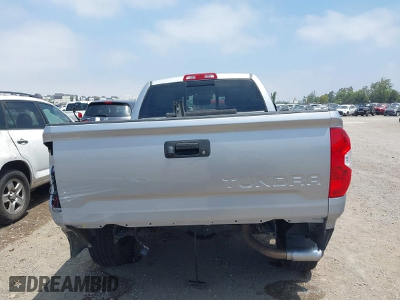 2016 Toyota Tundra SR z VIN 5TFRM5F1XGX099453, wystawiony jako IAAI lot #42492840 z przebiegiem 54 060 mil mil oraz . Historia ofert i sprzedaży dostępna na DreamBid. Obrazek 17.