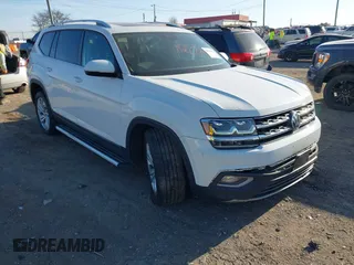 2018 Volkswagen Atlas 3.6L V6 SEL with VIN 1V2MR2CA8JC502440, listed as a IAAI auction lot 41753674 with 142,184 mi miles. Bid and sale history available at carsss.com. Image 1.