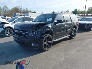 2014 Chevrolet Tahoe LT with VIN 1GNSCBE0XER202150, listed as a IAAI auction lot 41922771 with 168,693 mi miles and . Bid and sale history available at DreamBid. Image 17.