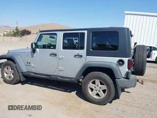 2008 Jeep Wrangler Unlimited X with VIN 1J4GA39168L592999, listed as a IAAI auction lot 42699909 with 158,128 mi miles and . Bid and sale history available at DreamBid. Image 14.