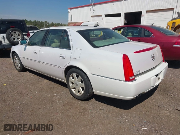 2006 Cadillac DTS w/1SC with VIN 1G6KD57Y56U132648, listed as a IAAI auction lot 41862030 with 128,003 mi miles. Bid and sale history available at carsss.com. Image 3.