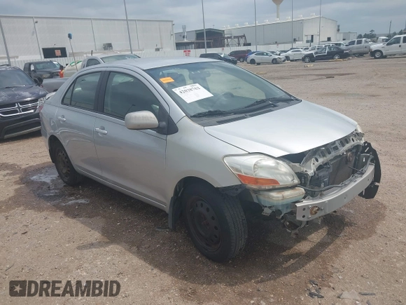 2008 Toyota Yaris with VIN JTDBT923184018720, listed as a IAAI auction lot 42038762 with 246,994 mi miles. Bid and sale history available at carsss.com. Image 1.