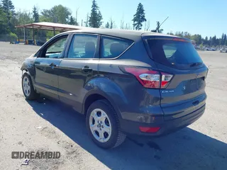 2018 Ford Escape S with VIN 1FMCU0F75JUD05716, listed as a IAAI auction lot 42733113 with 69,469 mi miles and . Bid and sale history available at DreamBid. Image 3.