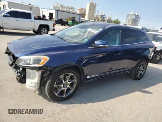 2015 Volvo XC60 z VIN YV449MDV1F2703105, wystawiony jako Copart lot #71062474 z przebiegiem 75 033 mil mil oraz Szkoda całkowita • Salvage title. Historia ofert i sprzedaży dostępna na DreamBid. Obrazek 1.