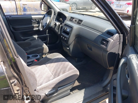2000 Honda CR-V EX z VIN JHLRD1863YS019249, wystawiony jako IAAI lot #42422174 z przebiegiem 238 345 mil mil oraz . Historia ofert i sprzedaży dostępna na DreamBid. Obrazek 5.