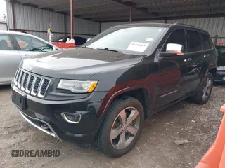 2015 Jeep Grand Cherokee Overland with VIN 1C4RJFCT4FC138404, listed as a IAAI auction lot 41188085 with 152,486 mi miles. Bid and sale history available at carsss.com. Image 2.