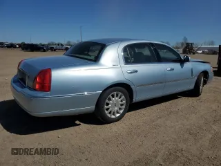 2006 Lincoln Town Car Signature z VIN 1LNHM81W36Y622915, wystawiony jako Copart lot #56097935 z przebiegiem 151 366 mil mil oraz Czysty tytuł • Clean title. Historia ofert i sprzedaży dostępna na DreamBid. Obrazek 3.