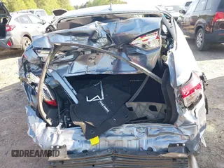 2024 Toyota Corolla LE with VIN 5YFB4MDE9RP101616, listed as a IAAI auction lot 42030741 with 27,141 mi miles and . Bid and sale history available at DreamBid. Image 6.