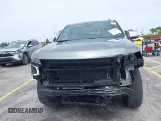 2023 Chevrolet Suburban Premier with VIN 1GNSCFKD2PR377493, listed as a IAAI auction lot 42426988 with 71,365 mi miles and . Bid and sale history available at DreamBid. Image 13.