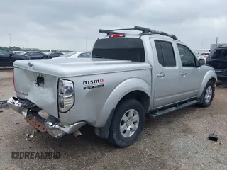 2005 Nissan Frontier LE with VIN 1N6AD07U25C457977, listed as a IAAI auction lot 41906592 with 256,116 mi miles and . Bid and sale history available at DreamBid. Image 4.