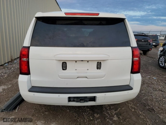 2019 Chevrolet Tahoe Commercial with VIN 1GNLCDEC2KR241479, listed as a Copart auction lot 83676744 with 104,092 mi miles and Salvage Title. Bid and sale history available at carsss.com. Image 6.