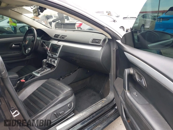 2013 Volkswagen CC Sport with VIN WVWBP7AN6DE504679, listed as a IAAI auction lot 42034362 with 148,527 mi miles. Bid and sale history available at carsss.com. Image 5.