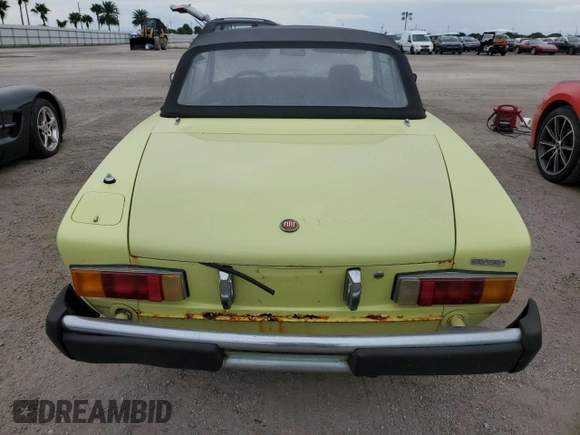 1978 FIAT 124 Spider z VIN 124CS10126825, wystawiony jako Copart lot #75075504 z przebiegiem 94 895 mil mil oraz Szkoda całkowita • Salvage title. Historia ofert i sprzedaży dostępna na DreamBid. Obrazek 6.