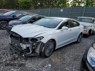 2014 Ford Fusion Titanium с VIN 3FA6P0K90ER196584, выставлен на аукционе Copart как лот 54660505 с пробегом 215 095 миль миль и Чистый • Clean title. История ставок и продаж доступна на DreamBid. Изображение 1.