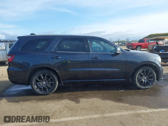 2015 Dodge Durango R/T with VIN 1C4SDJCT1FC188401, listed as a IAAI auction lot 42124652 with 86,339 mi miles and . Bid and sale history available at carsss.com. Image 13.