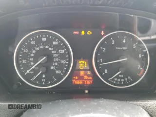 2012 BMW X5 35i z VIN 5UXZV4C55CL753810, wystawiony jako Copart lot #62405565 z przebiegiem 178 504 mil mil oraz Szkoda całkowita • Salvage title. Historia ofert i sprzedaży dostępna na DreamBid. Obrazek 9.
