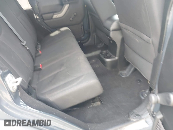 2018 Jeep Wrangler Unlimited Sport S with VIN 1C4BJWDG1JL849635, listed as a IAAI auction lot 42060964 with 60,405 mi miles and . Bid and sale history available at DreamBid. Image 8.