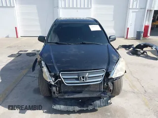 2005 Honda CR-V LX with VIN JHLRD78535C031868, listed as a IAAI auction lot 42002372 with 201,258 mi miles. Bid and sale history available at carsss.com. Image 13.