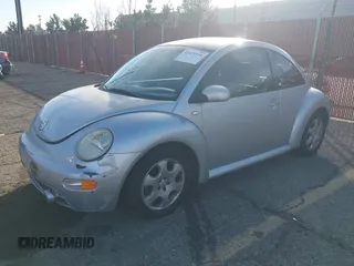 2003 Volkswagen New Beetle Coupe GLS with VIN 3VWCK21C53M418371, listed as a IAAI auction lot 41479358 with 148,867 mi miles. Bid and sale history available at carsss.com. Image 2.