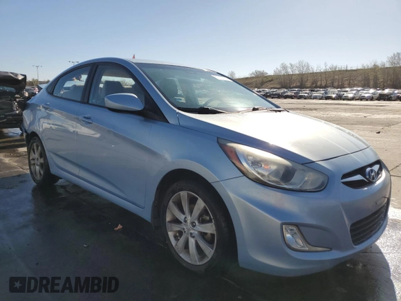 2012 Hyundai Accent GLS with VIN KMHCU4AE6CU185988, listed as a Copart auction lot 53572835 with 105,200 mi miles and Salvage Title. Bid and sale history available at carsss.com. Image 4.