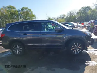 2019 Honda Pilot EX-L with VIN 5FNYF6H54KB038176, listed as a IAAI auction lot 42039560 with 52,404 mi miles and . Bid and sale history available at carsss.com. Image 14.
