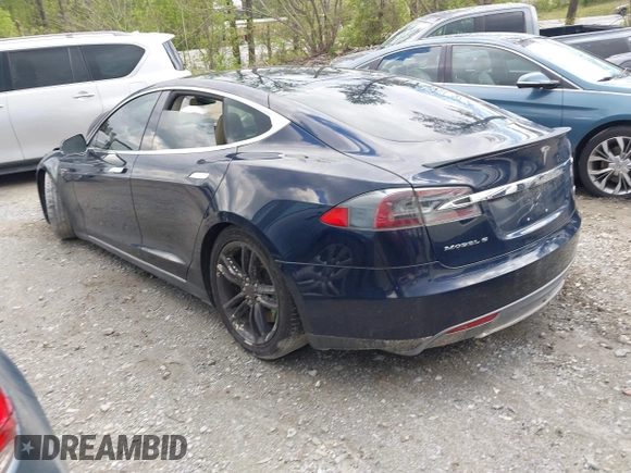 2014 Tesla Model S 60 with VIN 5YJSA1H15EFP43884, listed as a IAAI auction lot 41993180 with 78,305 mi miles and . Bid and sale history available at DreamBid. Image 3.