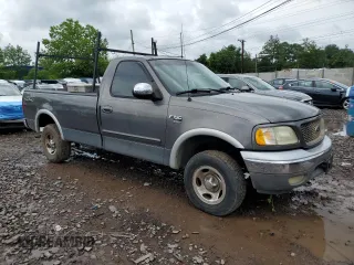 2002 Ford F-150 XL z VIN 2FTRF18W52CA50943, wystawiony jako Copart lot #62456605 z przebiegiem Nie podano mil oraz Szkoda całkowita • Salvage title. Historia ofert i sprzedaży dostępna na DreamBid. Obrazek 4.