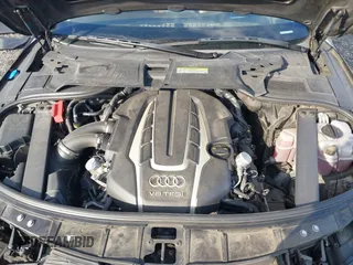 2015 Audi A8 L 4.0T with VIN WAU32AFD4FN014063, listed as a IAAI auction lot 41501970 with 158,570 mi miles. Bid and sale history available at carsss.com. Image 10.