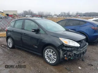 2017 Ford C-Max Energi SE with VIN 1FADP5EUXHL109586, listed as a IAAI auction lot 41473176 with 100,105 mi miles. Bid and sale history available at carsss.com. Image 1.