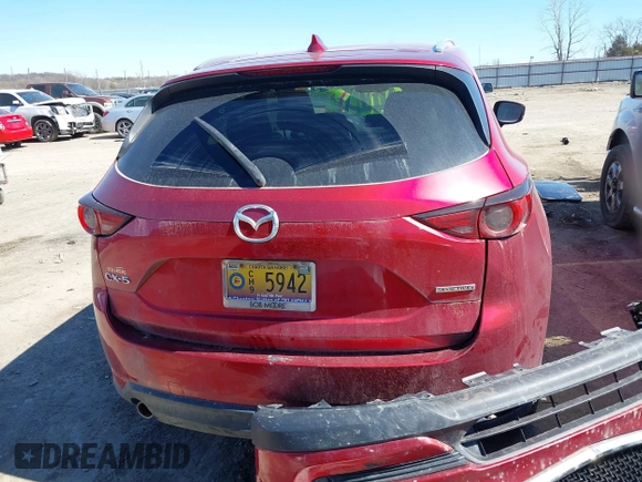 2020 Mazda CX-5 Grand Touring with VIN JM3KFADM3L0761286, listed as a IAAI auction lot 41715379 with 145,656 mi miles and . Bid and sale history available at DreamBid. Image 17.