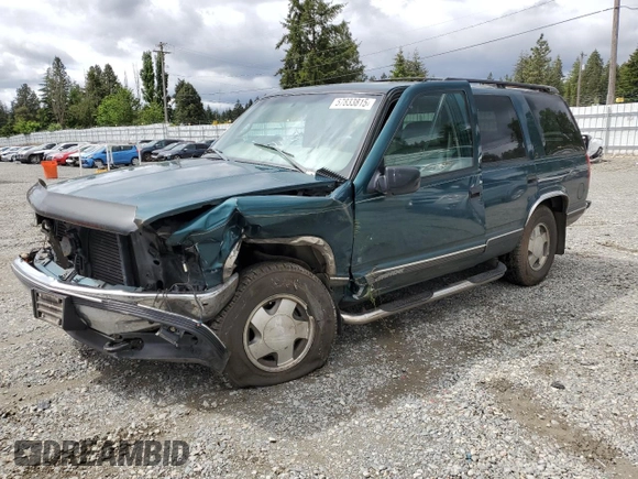1998 Chevrolet Tahoe z VIN 1GNEK13R2WJ304666, wystawiony jako Copart lot #57833815 z przebiegiem 199 103 mil mil oraz Szkoda całkowita • Salvage title. Historia ofert i sprzedaży dostępna na DreamBid. Obrazek 1.