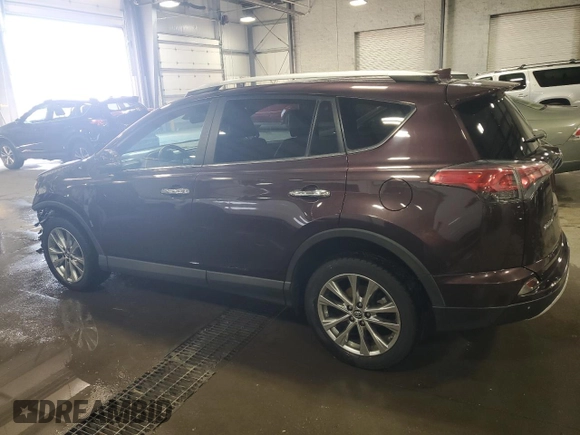 2016 Toyota RAV4 Limited with VIN 2T3DFREV3GW537010, listed as a Copart auction lot 52183005 with 133,558 mi miles and Salvage title. Bid and sale history available at DreamBid. Image 2.