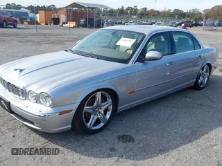 2005 Jaguar XJ with VIN SAJWA79C05SG45650, listed as a IAAI auction lot 41262315 with 76,127 mi miles. Bid and sale history available at carsss.com. Image 2.