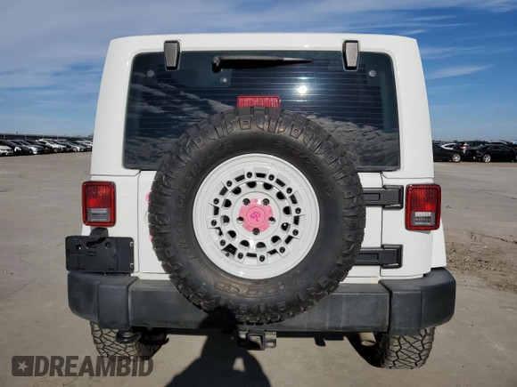 2013 Jeep Wrangler Rubicon с VIN 1C4BJWCG9DL612316, выставлен на аукционе Copart как лот 87823565 с пробегом 66 254 миль миль и Списание • Salvage title. История ставок и продаж доступна на DreamBid. Изображение 6.