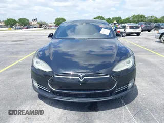 2015 Tesla Model S 85D with VIN 5YJSA1H21FFP79565, listed as a IAAI auction lot 42076401 with 162,139 mi miles. Bid and sale history available at carsss.com. Image 6.