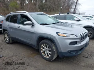 2016 Jeep Cherokee Latitude with VIN 1C4PJMCB4GW203710, listed as a IAAI auction lot 42017248 with 216,117 mi miles. Bid and sale history available at carsss.com. Image 1.
