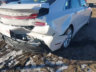2014 Lincoln MKZ with VIN 3LN6L2GK3ER800458, listed as a IAAI auction lot 41233924 with 106,048 mi miles. Bid and sale history available at carsss.com. Image 6.