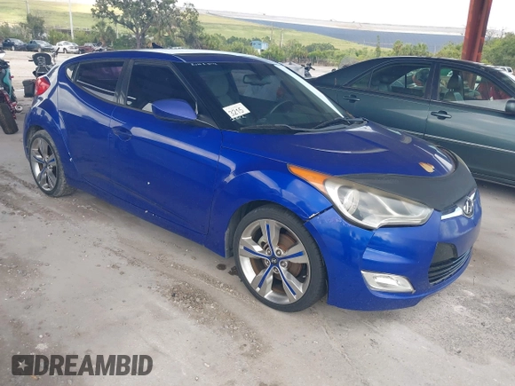 2012 Hyundai Veloster w/Gray Int z VIN KMHTC6AD0CU034683, wystawiony jako IAAI lot #42395112 z przebiegiem 134 388 mil mil oraz . Historia ofert i sprzedaży dostępna na DreamBid. Obrazek 1.