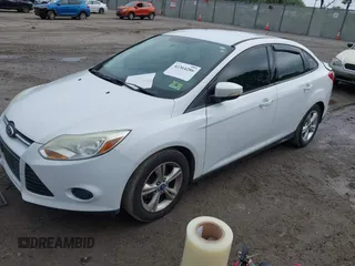2013 Ford Focus SE z VIN 1FADP3F29DL372289, wystawiony jako IAAI lot #42364286 z przebiegiem 201 091 mil mil oraz . Historia ofert i sprzedaży dostępna na DreamBid. Obrazek 2.