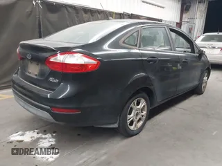 2015 Ford Fiesta SE with VIN 3FADP4BJ1FM133520, listed as a IAAI auction lot 42229311 with 174,734 mi miles and . Bid and sale history available at DreamBid. Image 4.