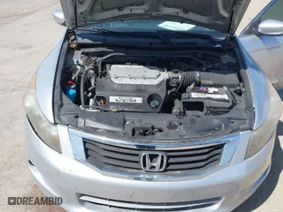 2009 Honda Accord Sdn EX-L with VIN 1HGCP36849A009901, listed as a IAAI auction lot 42057198 with 130,306 mi miles. Bid and sale history available at carsss.com. Image 10.