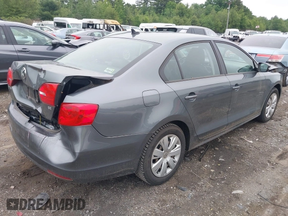 2014 Volkswagen Jetta SE with VIN 3VWD07AJ7EM239807, listed as a IAAI auction lot 42457159 with 72,637 mi miles and . Bid and sale history available at DreamBid. Image 4.