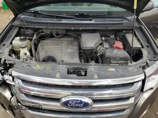 2014 Ford Edge SEL z VIN 2FMDK4JC2EBA50332, wystawiony jako Copart lot #87367284 z przebiegiem 164 873 mil mil oraz Szkoda całkowita • Salvage title. Historia ofert i sprzedaży dostępna na DreamBid. Obrazek 12.