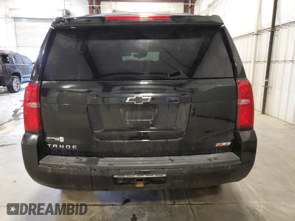 2017 Chevrolet Tahoe LT z VIN 1GNSKBKC8HR289441, wystawiony jako Copart lot #50791845 z przebiegiem 128 105 mil mil oraz Szkoda całkowita • Salvage title. Historia ofert i sprzedaży dostępna na DreamBid. Obrazek 6.