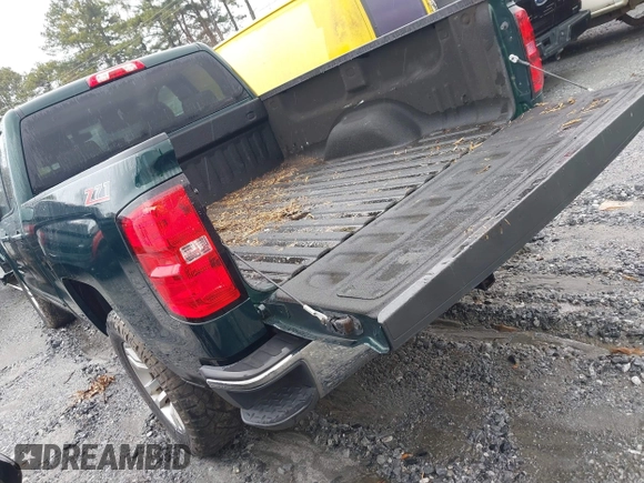 2015 Chevrolet Silverado 1500 LT with VIN 1GCRCREHXFZ267054, listed as a IAAI auction lot 41543297 with 134,087 mi miles. Bid and sale history available at carsss.com. Image 3.