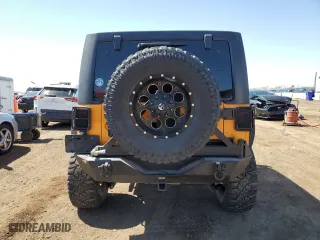 2012 Jeep Wrangler Unlimited Sport with VIN 1C4BJWDG8CL207111, listed as a Copart auction lot 51208395 with 87,926 mi miles and Salvage Title. Bid and sale history available at carsss.com. Image 6.