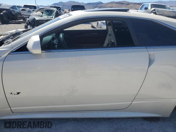 2013 Cadillac CTS-V z VIN 1G6DV1EP2D0172229, wystawiony jako Copart lot #63103464 z przebiegiem Nie podano mil oraz Szkody całkowita. Historia ofert i sprzedaży dostępna na DreamBid. Obrazek 7.