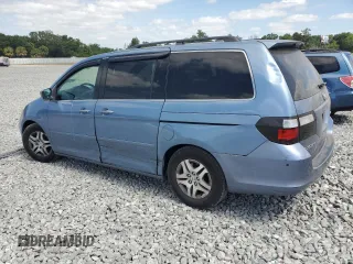 2007 Honda Odyssey EX with VIN 5FNRL38457B052131, listed as a Copart auction lot 55226575 with 165,745 mi miles and Salvage Title. Bid and sale history available at DreamBid. Image 2.