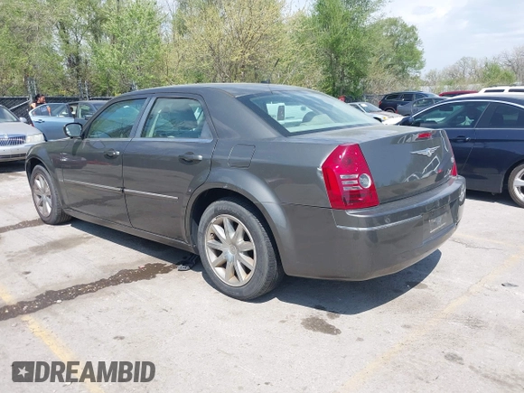 2008 Chrysler 300 Touring with VIN 2C3LA53G48H295678, listed as a IAAI auction lot 42007155 with 218,020 mi miles. Bid and sale history available at carsss.com. Image 3.