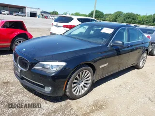 2012 BMW 7 Series 750i with VIN WBAKA8C50CCY37892, listed as a IAAI auction lot 42080313 with 148,058 mi miles. Bid and sale history available at carsss.com. Image 2.